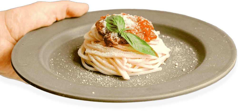 Spaghetti boloñesa con parmigiano